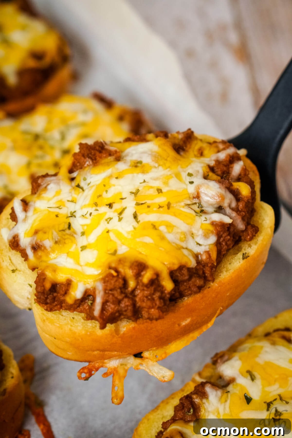 A delicious Garlic Bread Sloppy Joe recipe featuring savory ground beef on crispy garlic bread, topped with melted cheese, perfect for a quick family dinner.