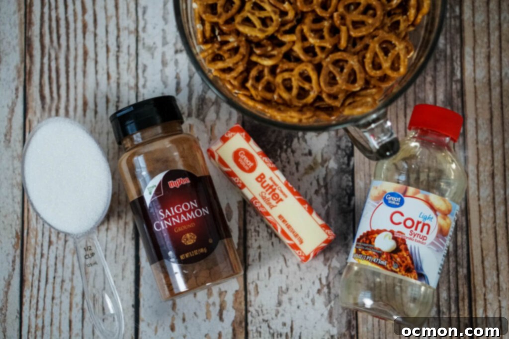 Golden Cinnamon Knots 4 White granulated sugar, Saigon cinnamon, a stick of butter, a bowl of pretzels, and a bottle of corn syrup.