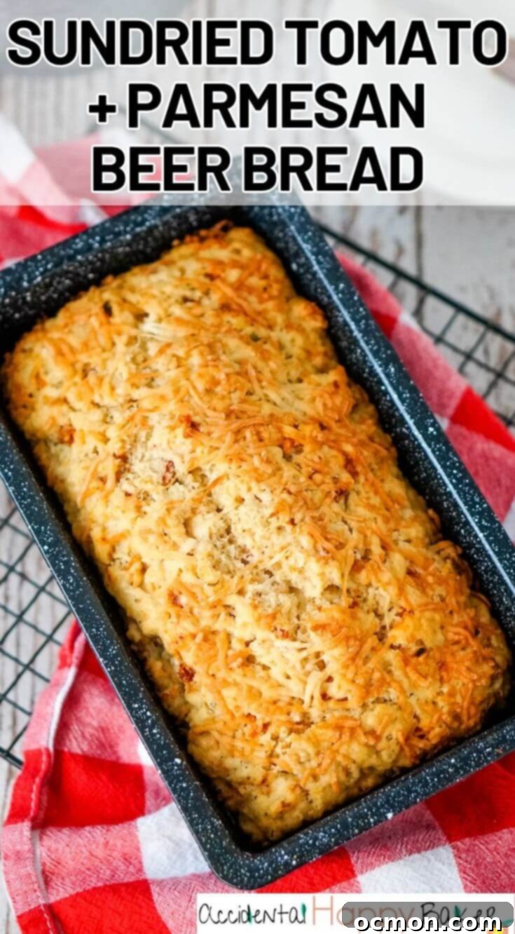 A vibrant, eye-catching pin image for Sun-dried Tomato and Parmesan Beer Bread, encouraging readers to save the recipe.