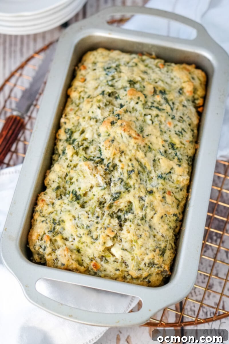 A delicious loaf of Spinach and Feta Beer Bread, perfect for any occasion.