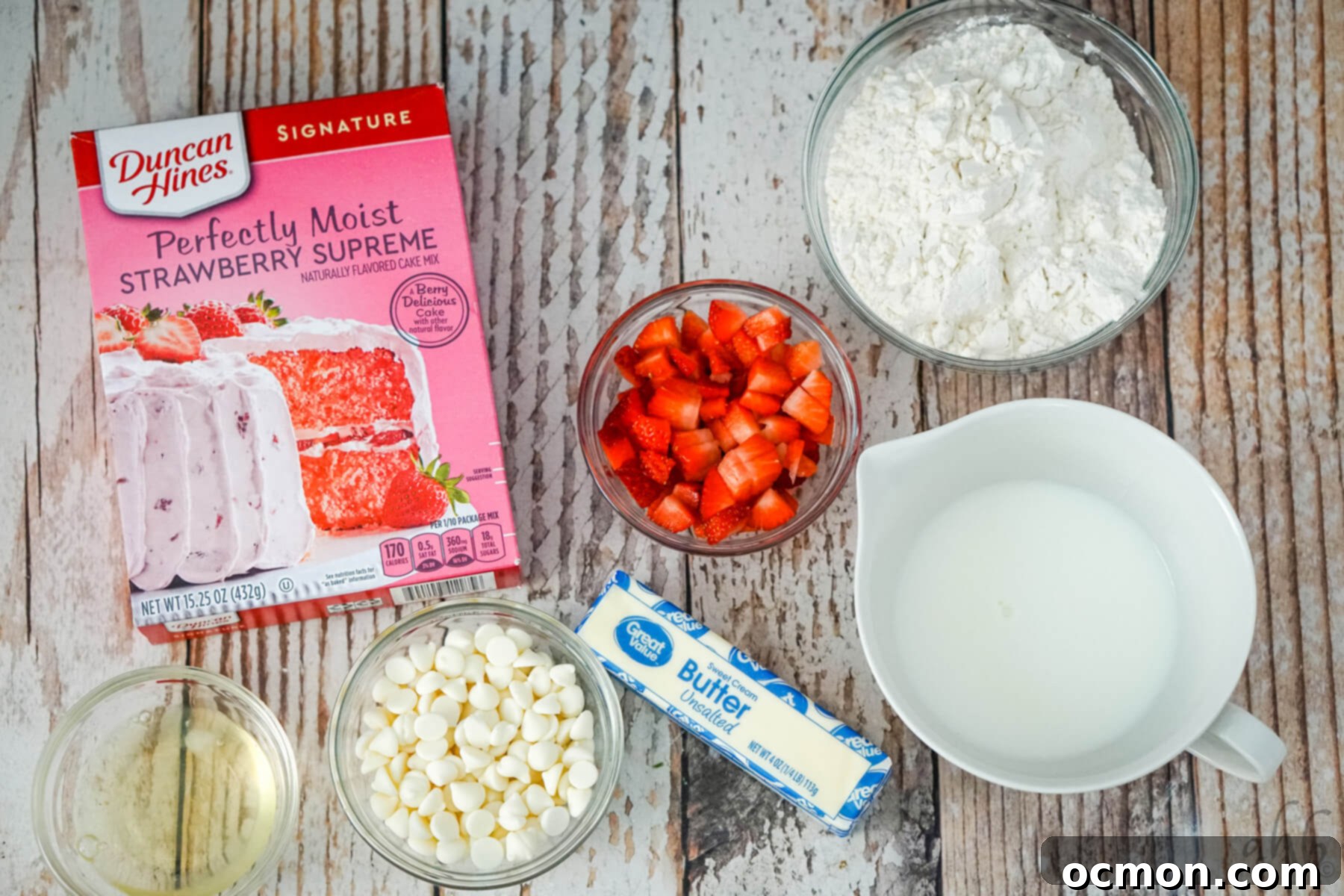 Strawberry Cake Scone Magic 4 The ingredients needed to make strawberry cake mix scones: strawberry cake mix, chopped strawberries, flour, egg white, white chocolate chips, butter, and milk.