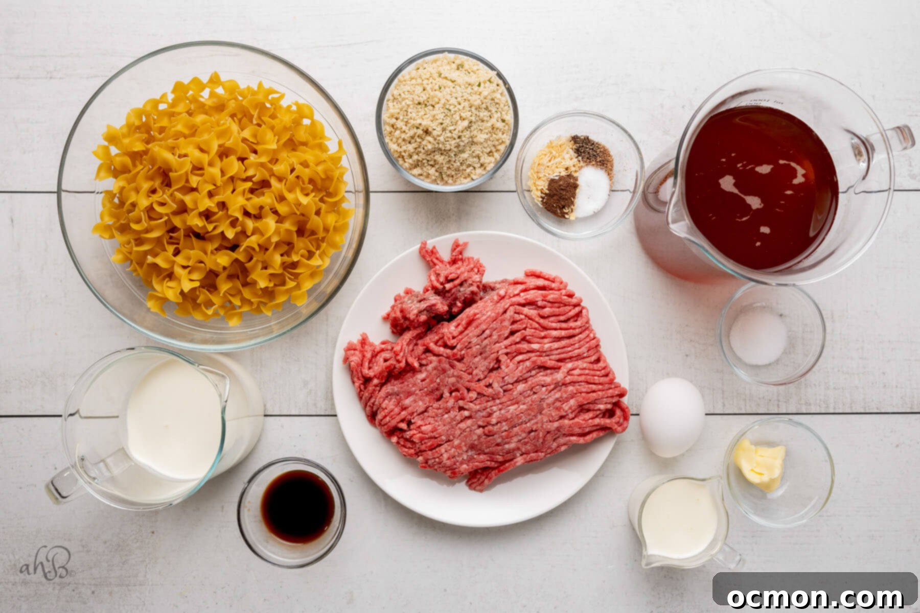 The ingredients for Swedish meatballs and the ingredients for the gravy are laid out on a table, ready for cooking.