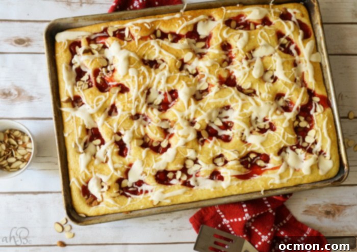 Classic Cherry Almond Squares, featuring a tender cake base, sweet cherry topping, and a delightful almond glaze.