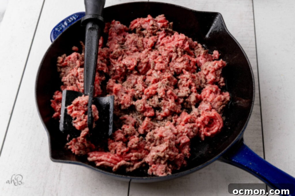 Skillet Pizza Peppers 3 The ground beef is browned in a skillet.