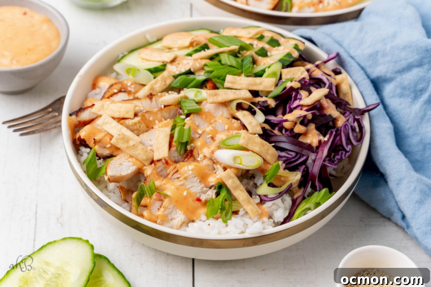 A white bowl of a serving of Bang bang chicken.