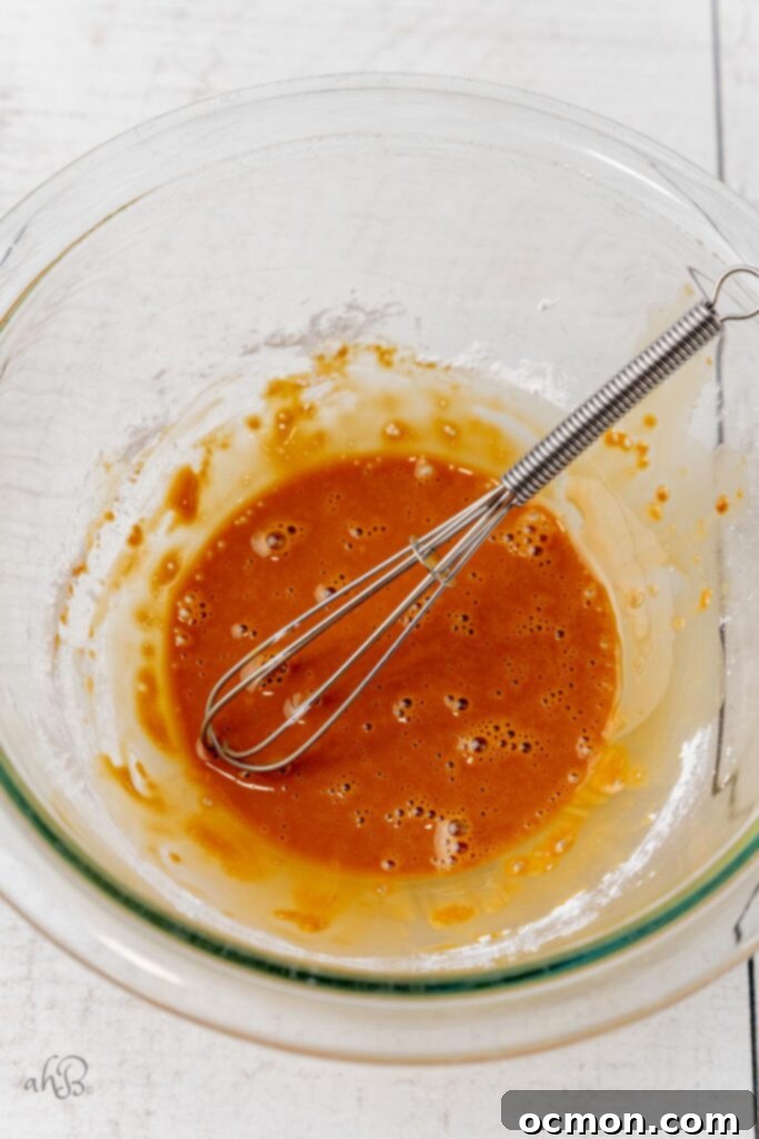 Whisk together soy sauce and cornstarch. Toss the shrimp in the mixture. 