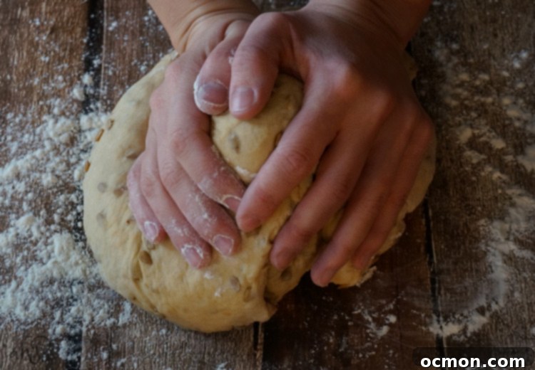 Freshly baked Sunflower Bread cooling on a wire rack, highlighting its golden crust and delightful texture.
