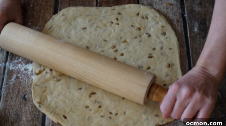 Close-up of Sunflower Bread loaf with visible seeds and a beautiful golden-brown crust.
