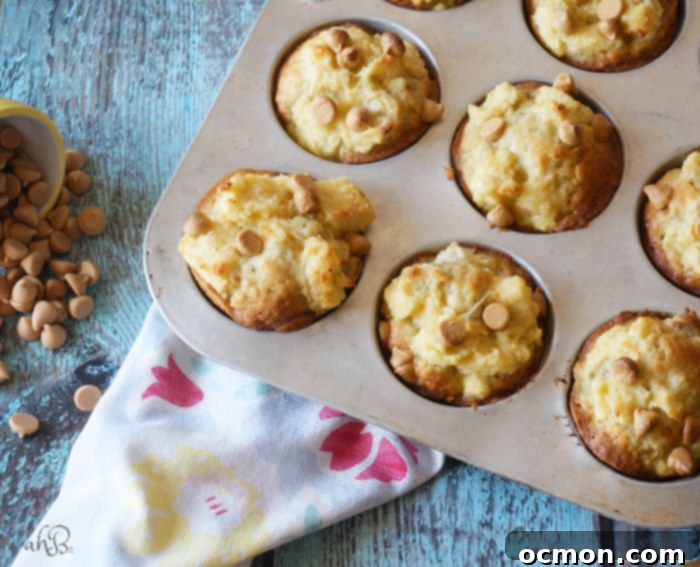 Golden Banana French Toast Muffins 4 Banana French Toast Muffins, soft and moist banana muffins with a fluffy french toast topping and a sprinkle of peanut butter chips.