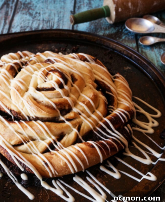 Chocolate Cinnamon Rolls. The easiest and biggest chocolate cinnamon roll you'll ever make! 