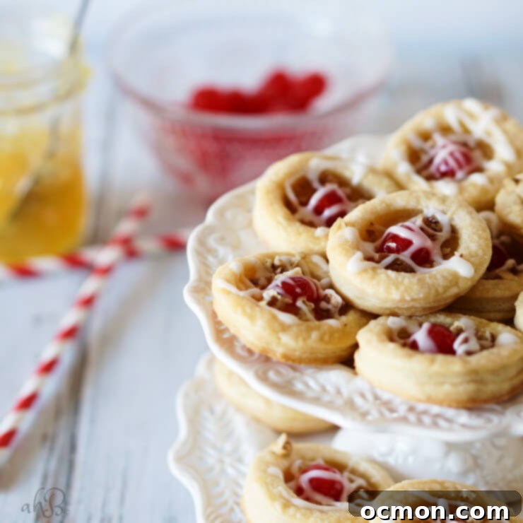 Close-up of Pineapple Cookies on a cooling rack, highlighting the intricate glaze and toppings.