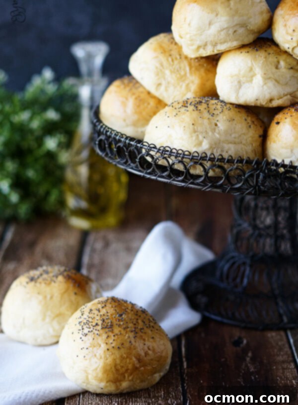 Sweet Onion Rolls 3 Close-up of freshly baked Caramelized Onion Buns on a baking sheet.
