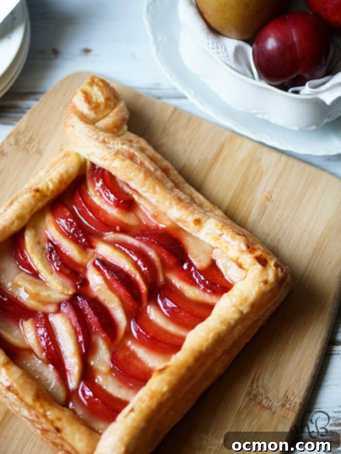 Delicious Pear Plum Galette with flaky crust and sweet-tart filling
