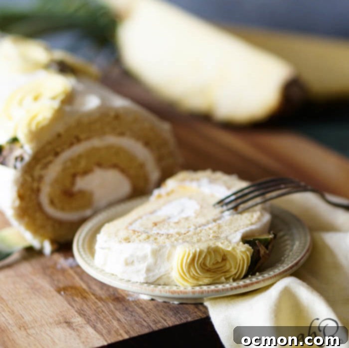 Pina Colada Swiss Cake Roll being rolled