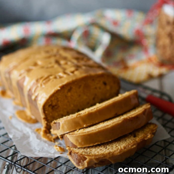 Sliced Triple Butterscotch Pound Cake with glaze on a plate