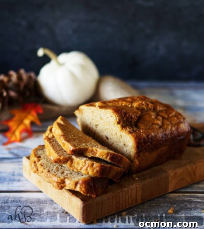 Cozy Pumpkin Ale Bread 3 Close-up of baked Pumpkin Beer Bread slice, showing its moist texture and golden crust