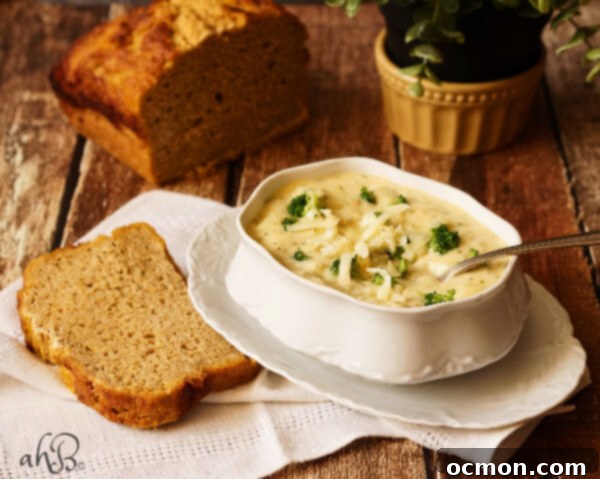 Velvety Cheddar Broccoli Soup 4 Broccoli cheese soup served with a slice of focaccia bread