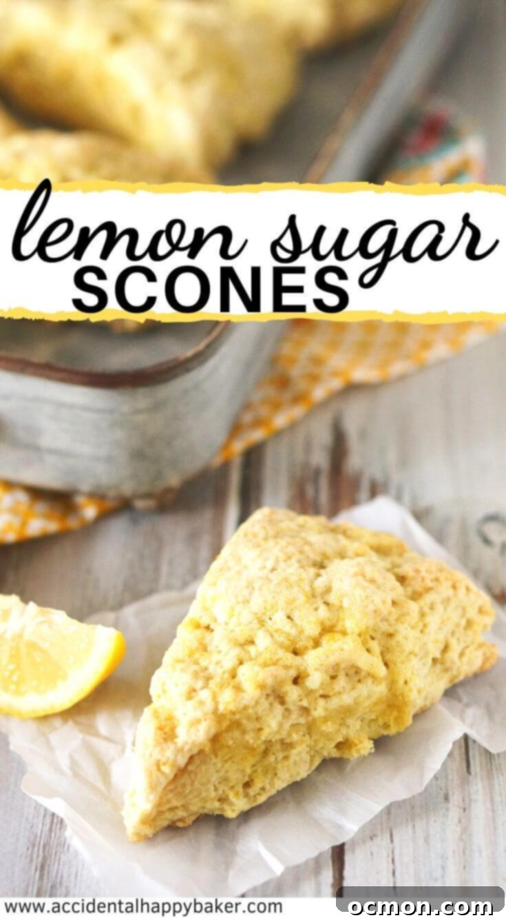 A plate of freshly baked lemon sugar scones with a vibrant yellow lemon in the background, ready to be enjoyed.
