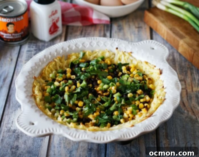 Smoky Southwestern Chipotle Quiche 5 Close-up of the Southwestern Chipotle Quiche filling before baking, showing a colorful mix of corn, black beans, green onions, and cheese.