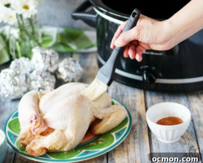 Slow Cooker Tender Roasted Chicken 5 Juicy crockpot roasted chicken, shredded and ready for versatile meal preparation.