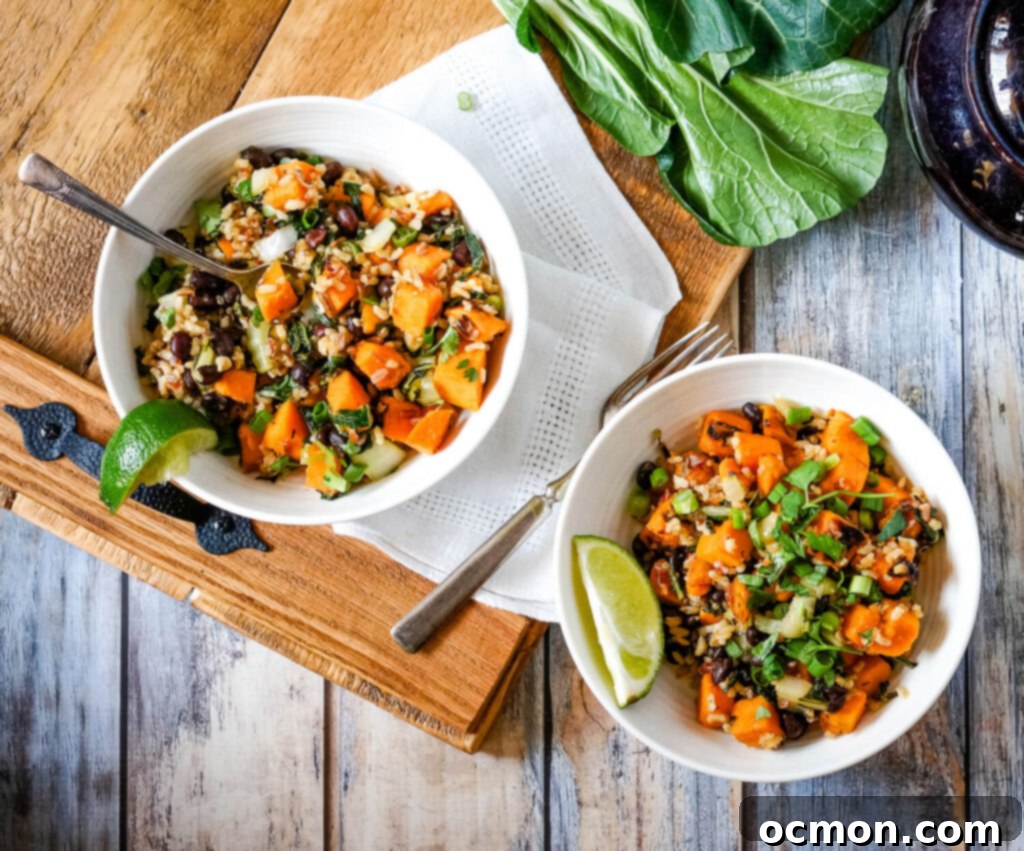 Overhead shot of a bowl of sweet potato sweet chili with a lime wedge