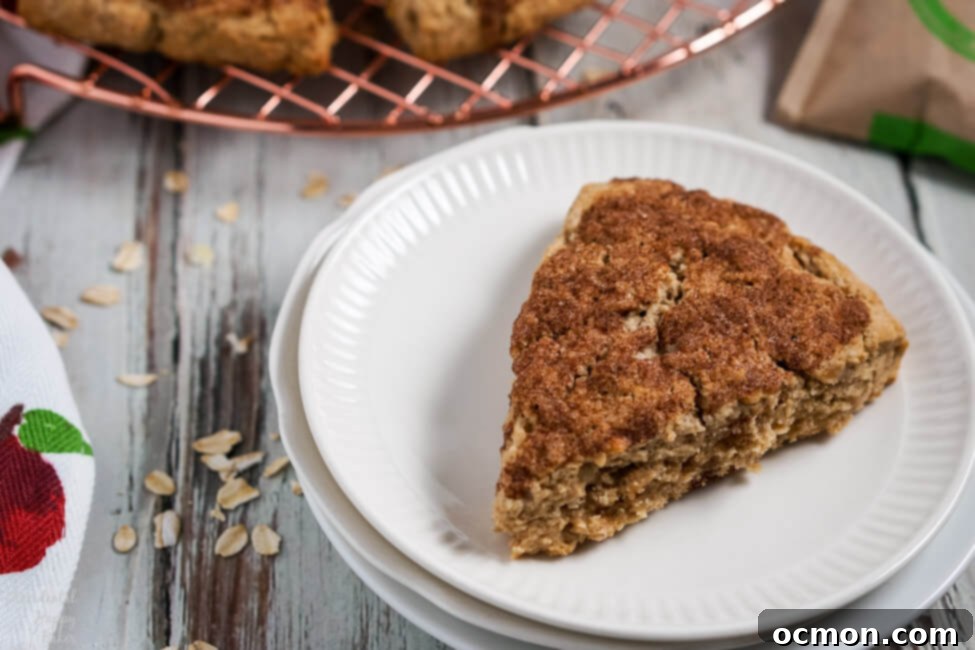 Quick Oatmeal Scones 8 A fresh baked instant oatmeal scone on a plate.