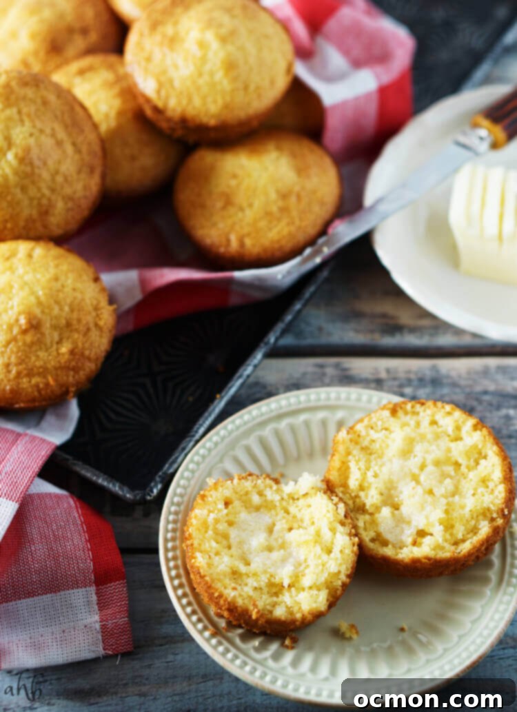 Boxed Cornbread: The Secret to Baking Brilliance 4 A cornbread muffin sliced with melted butter in the center.