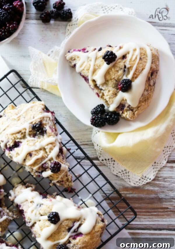 Decadent Blackberry Cream Cheese Scones 3 Close-up of baked Blackberry Cream Cheese Scones with glaze