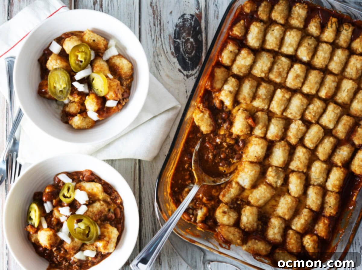 Loaded Chili Cheese Tater Tot Bake 3 Two servings of Chili Cheese Tater Tot Casserole next to a casserole pan.