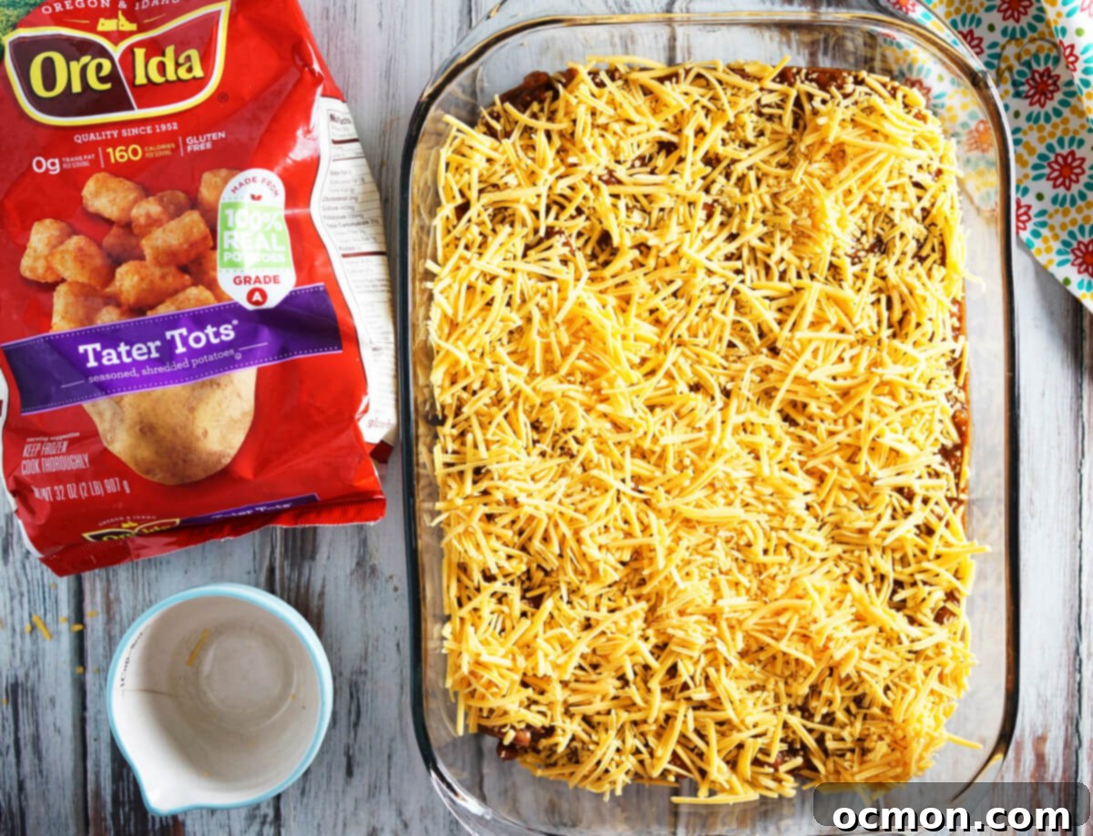 Loaded Chili Cheese Tater Tot Bake 6 Shredded cheese goes over the top of the chili.