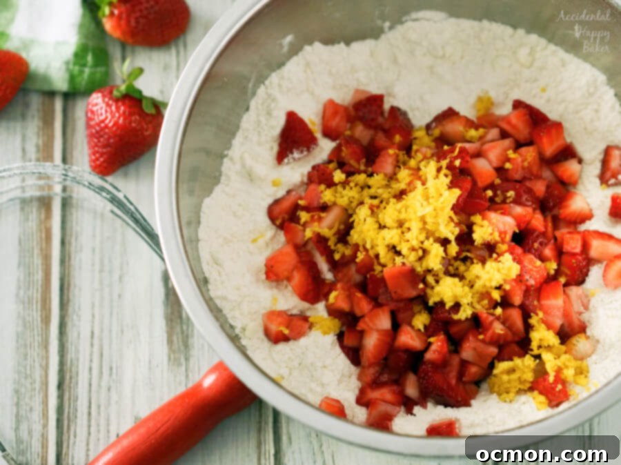 Chopped strawberries and lemon zest are ready to be mixed in to the Strawberry Lemon Scone Dough