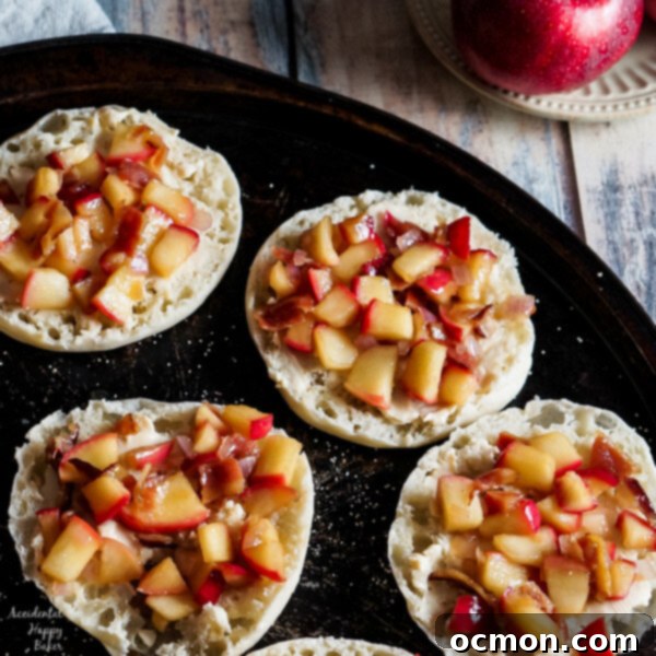 Three Apple Bacon Cheese English Muffins on a serving board