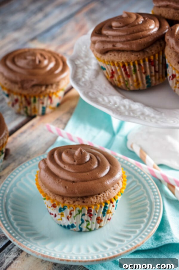 Warmly Spiced Nutella Indulgence 2 Soft and moist Spiced Nutella Cupcakes topped with chocolate whipped Nutella frosting