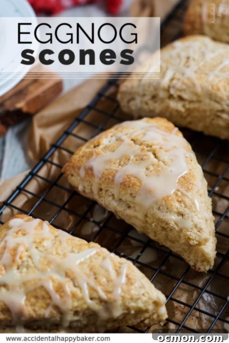 Beautifully glazed Eggnog Scones arranged for a Pinterest pin, showcasing their festive appeal