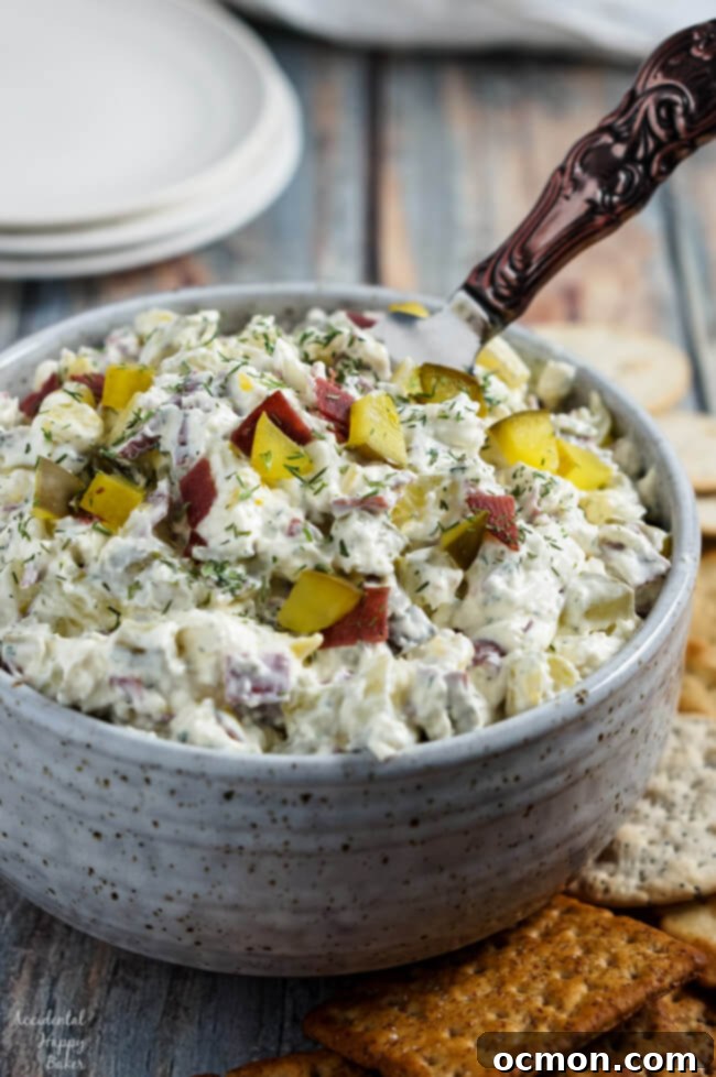 Creamy Dill Pickle Dip served with crackers, a perfect party appetizer.