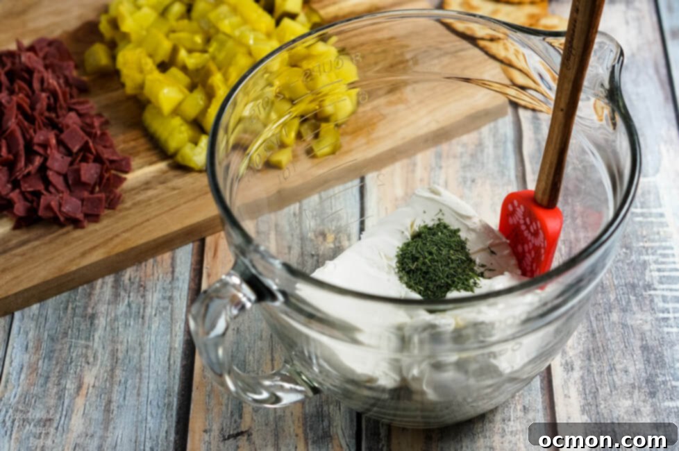 Close-up of Creamy Dill Pickle Dip showing texture and ingredients.
