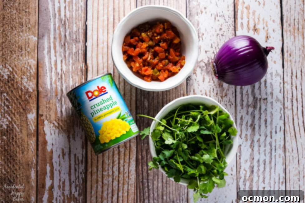 Easy Pineapple Salsa served with colorful tortilla chips