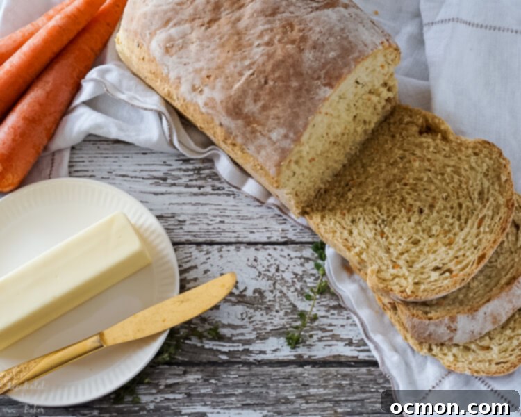 Garden Carrot & Chive Loaf 3 Freshly sliced homemade carrot and chive bread, revealing its interior texture, next to a plate with a slice of bread and butter, ready to be enjoyed.