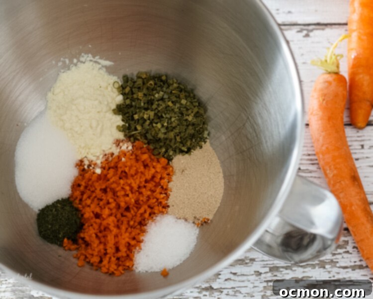 Garden Carrot & Chive Loaf 4 A bowl containing shredded carrots, fresh chives, dill weed, salt, sugar, active dry yeast, and dried buttermilk powder, ready for mixing.