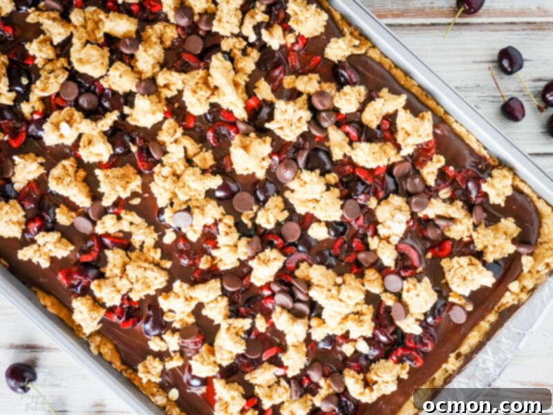 A pan of cherry revel bars ready to be put in the oven to bake.