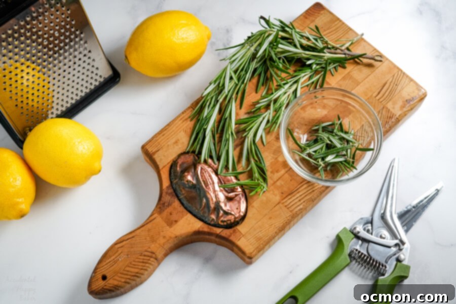 Lemon Rosemary Cookies baking on a tray, simple fresh flavors of lemons and rosemary meld together in these buttery shortbread cookies to make an unassuming cookie with a dynamic flavor combination.