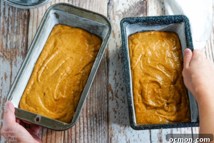 Downeast Maine Pumpkin Bread batter poured into a loaf pan, ready for baking.