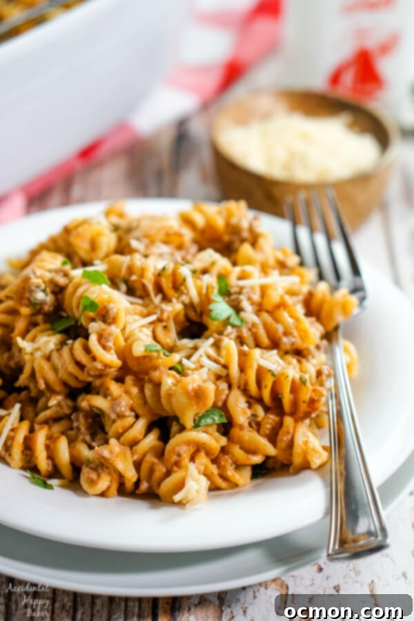A white plate piled high with a serving of Amish Country Casserole.
