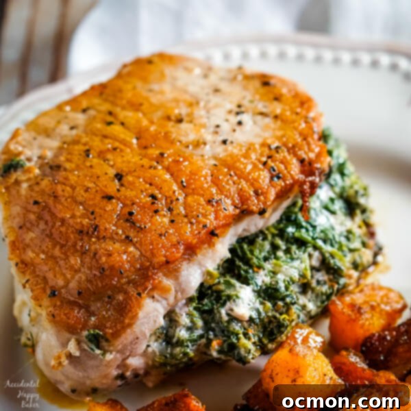 Savory Spinach-Filled Pork Chops 8 Finished plate of golden-browned spinach stuffed pork chops