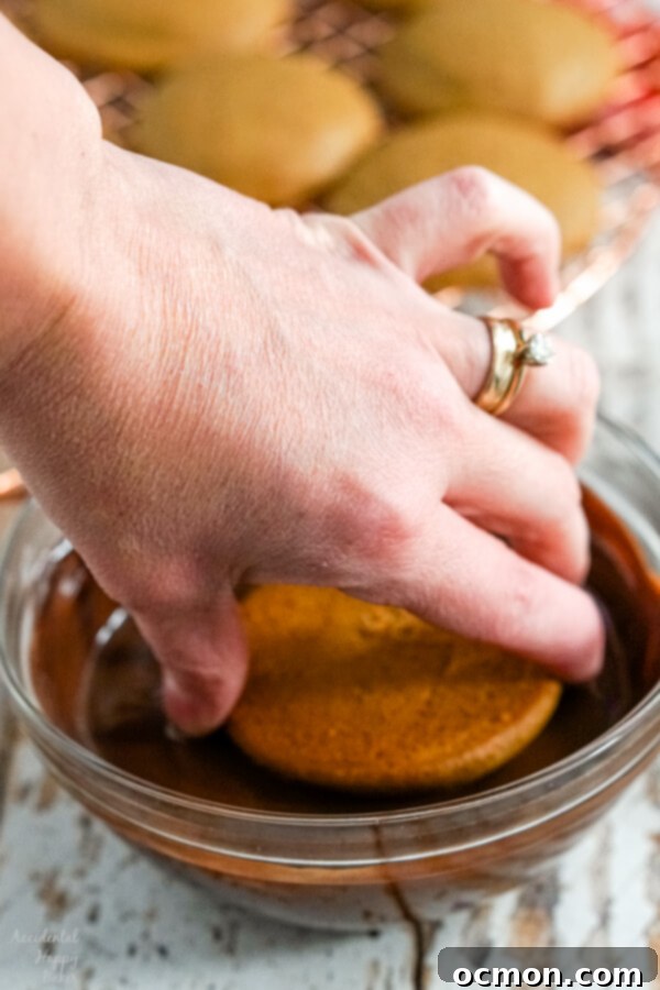 The top of each traditional German Gingerbread Cookie is carefully dipped into melted chocolate for a delicious finish.
