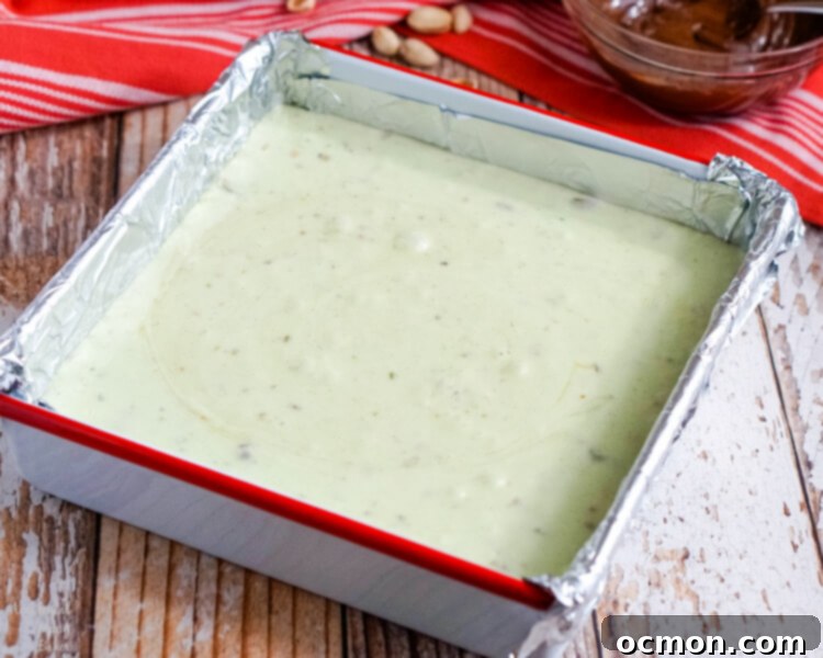 Pistachio Marble Fudge 6 The hot pistachio fudge is poured into the pan.