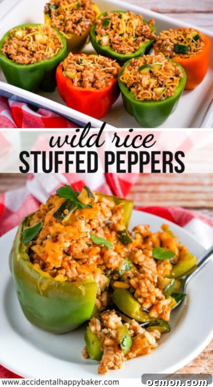 Wild Rice Stuffed Peppers: A close-up shot of a baked bell pepper filled with a savory mixture of wild rice, sausage, and vegetables, topped with melted cheese, on a rustic wooden board.