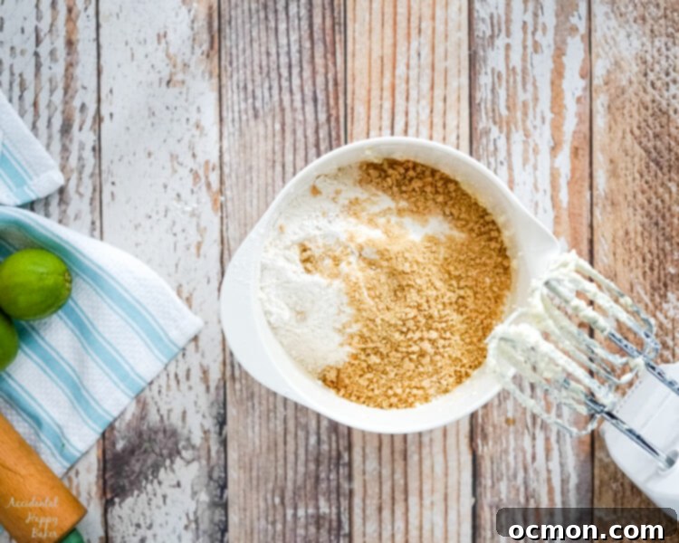 The dry ingredients and graham cracker crumbs are added next. 