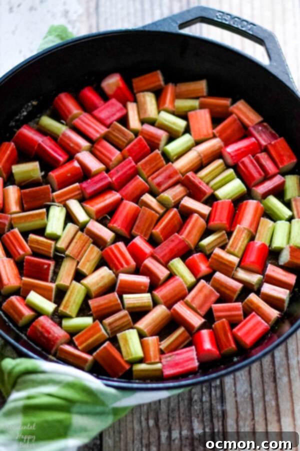 Zingy Rhubarb Ginger Upside Down Cake 5 Chopped rhubarb goes on top of the sugar topping.