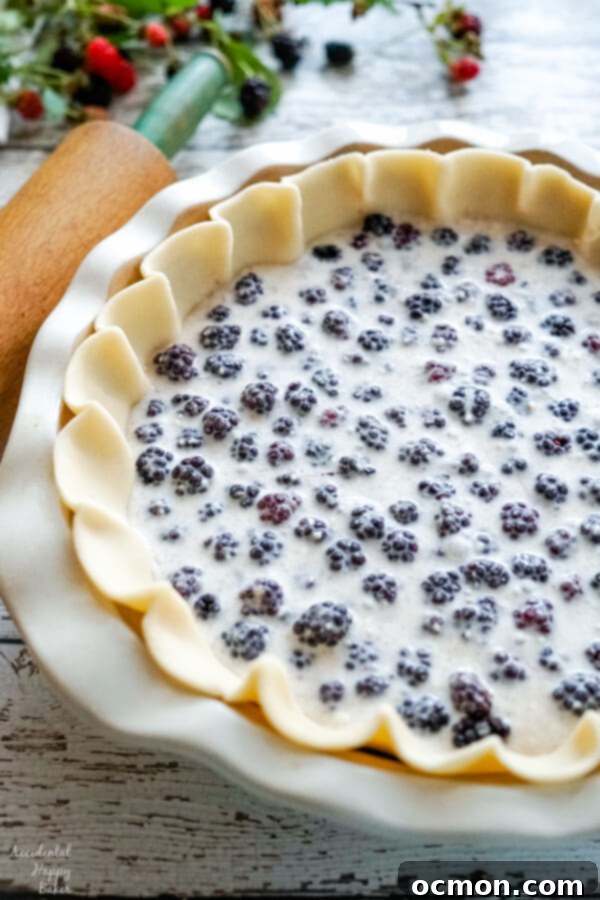 Luscious Blackberry Cream Pie 6 An image of the pie after the filling has been added, but before the pie is baked.